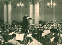 Vladimir Yeshayavitch Novak, a beloved and honored violin pedagogue and violinist in Kiev Philharmonic. Conducting the youth orchestra in the historic concert hall in the Khrestchaty Park in Kiev, Ukraine.
